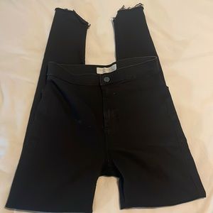 Topshop black stretchy skinny jeans. Size 28